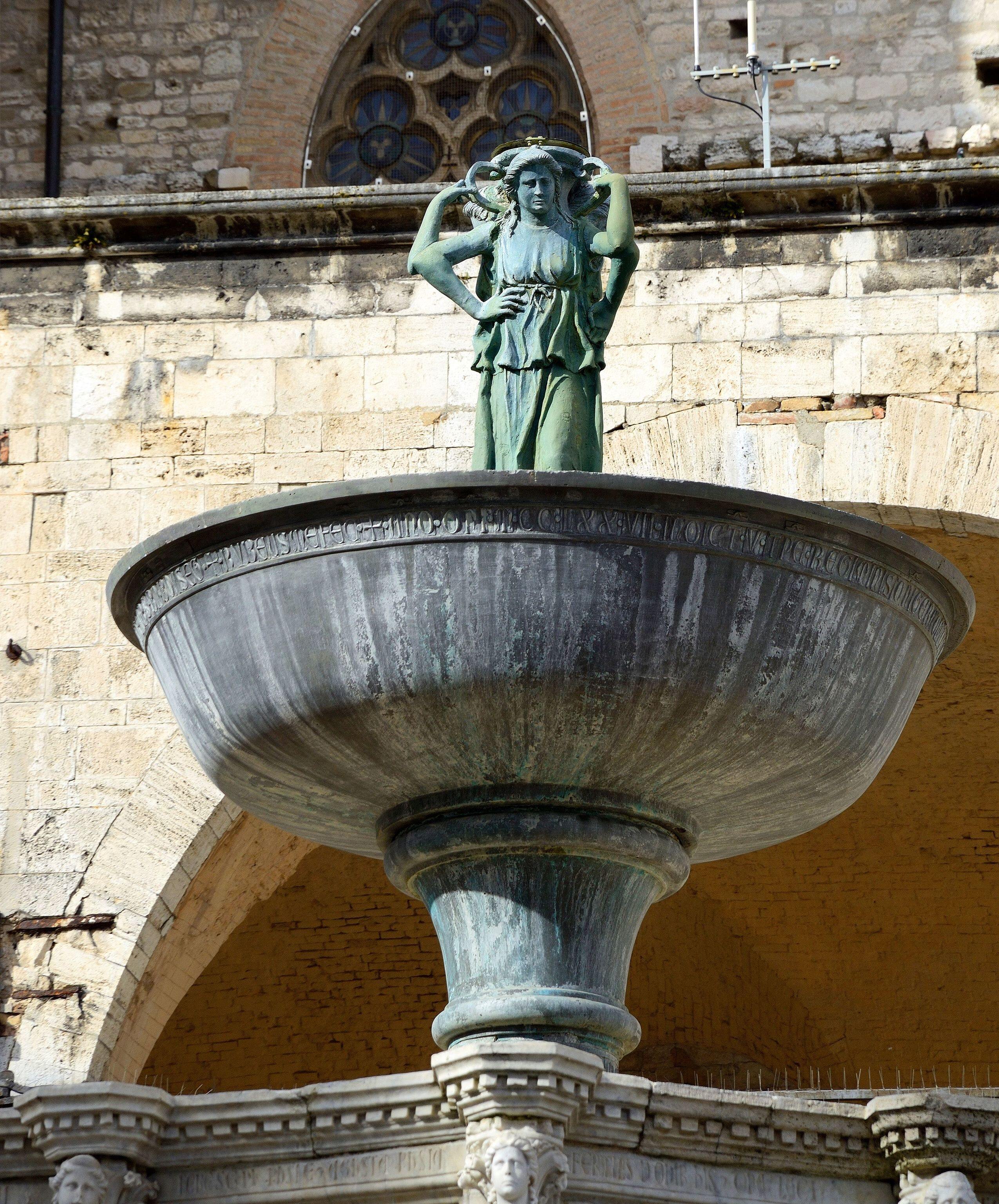 Cup bronze with nymphs of the Fontana Maggiore in Perugia