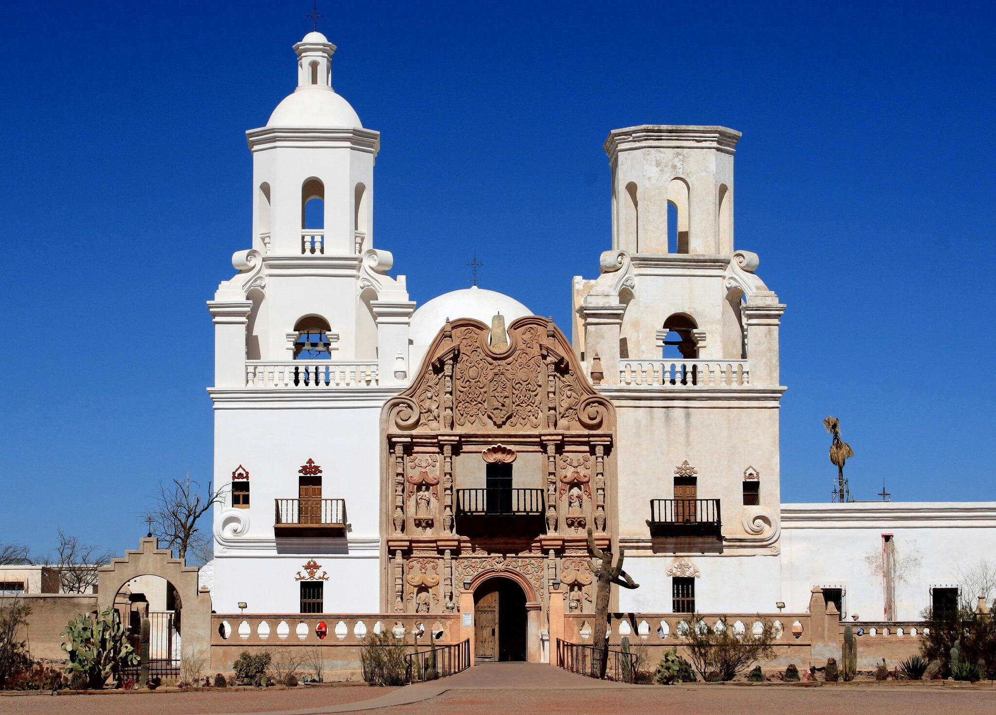 Tucson - The Mission Xavier del Bac is an impressive site about 10 miles south of Tucson, AZ. The outside is gleaming white and the inside is a mix of colors - it was definitely worth a trip to visit this Mission.
