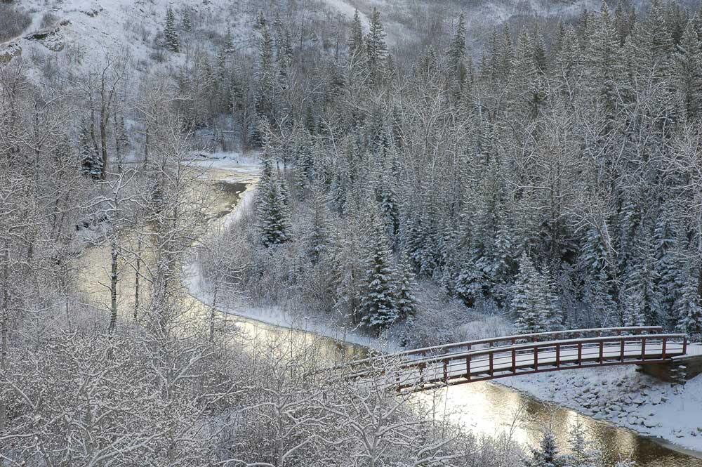 Looking east over Bridge 5 in Fish Creek Provincial Park in Calgary, Alberta, Canada. Taken by Chuck Szmurlo on March 13 2005 with a Nikon D70 and a…