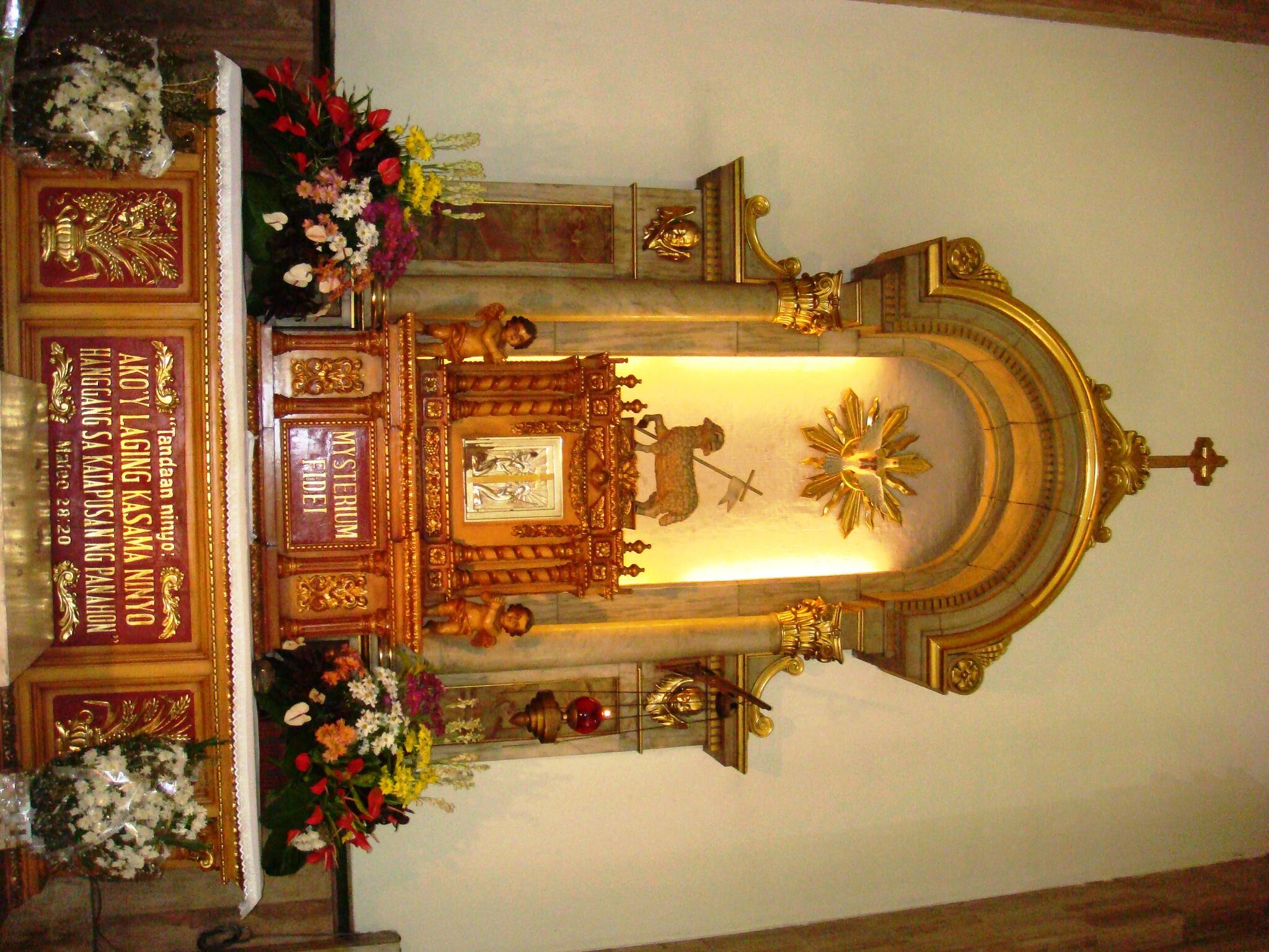 The Blessed Sacrament Altar (left side, beside the Main Altar)